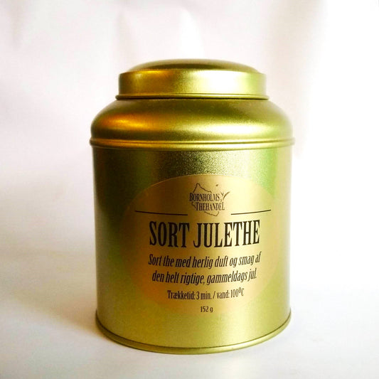Black Yulethe in a beautiful gold tin